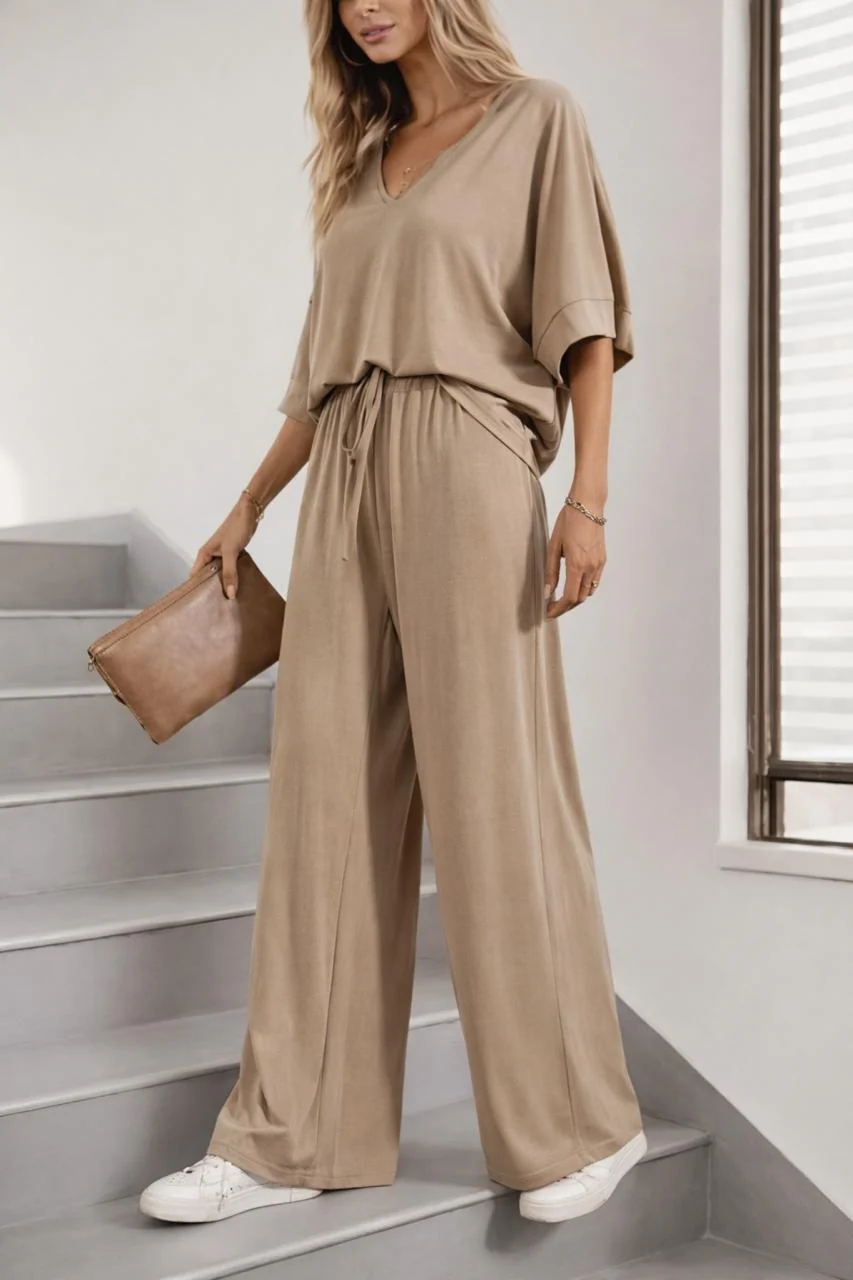 0000 Skin V-Neck Baggie Style Down Should Half Sleeves With Matching Plazzo Style Loose Trouser.